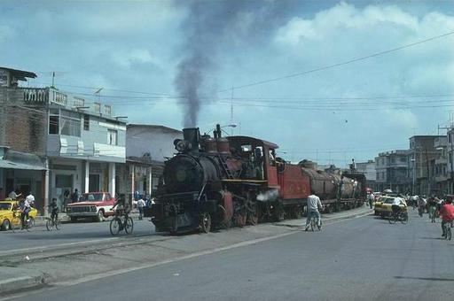 The Mixto  with lowland engine 11 crosses the city of Milagro on the way from Yaguachi to Bucay, Ecuador.